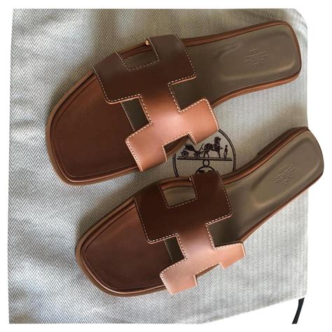 hermes sandalen oran braun|Hermes oran sandal price.